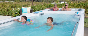 family in an endless pool